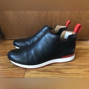 Black Leather VIONIC Slip-On Sneakers with Red Accents